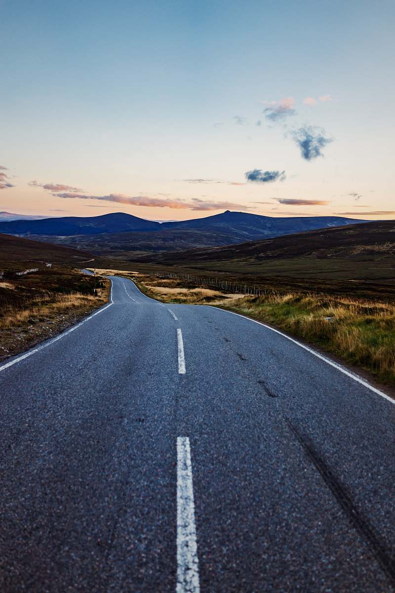 landscape empty road towards mountain scotland