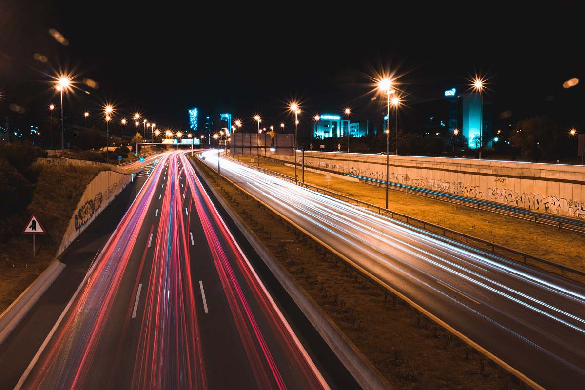 freeway lighted cars passing highway highway