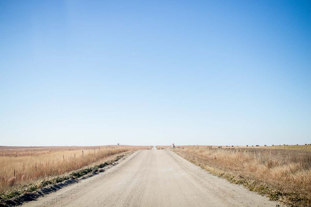 sky road under blue sky gravel