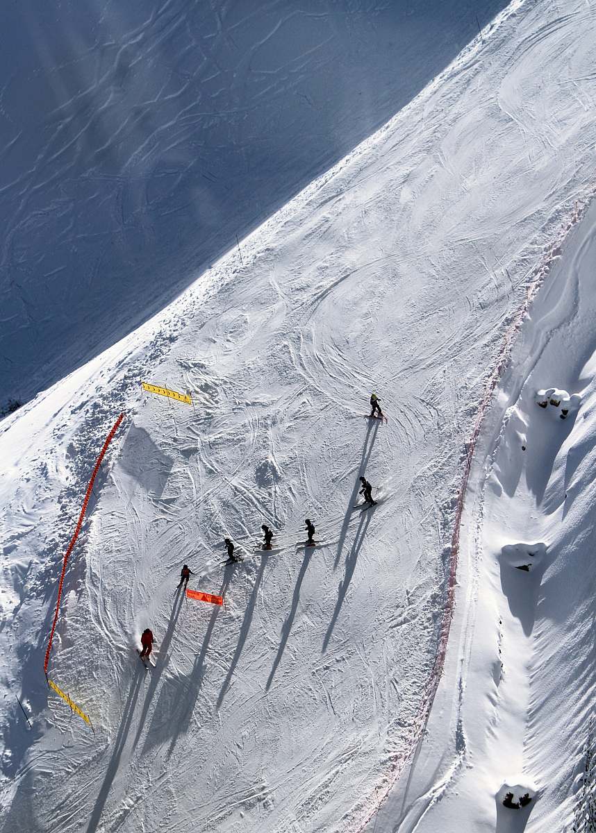 outdoors top view of people skating on snow winter