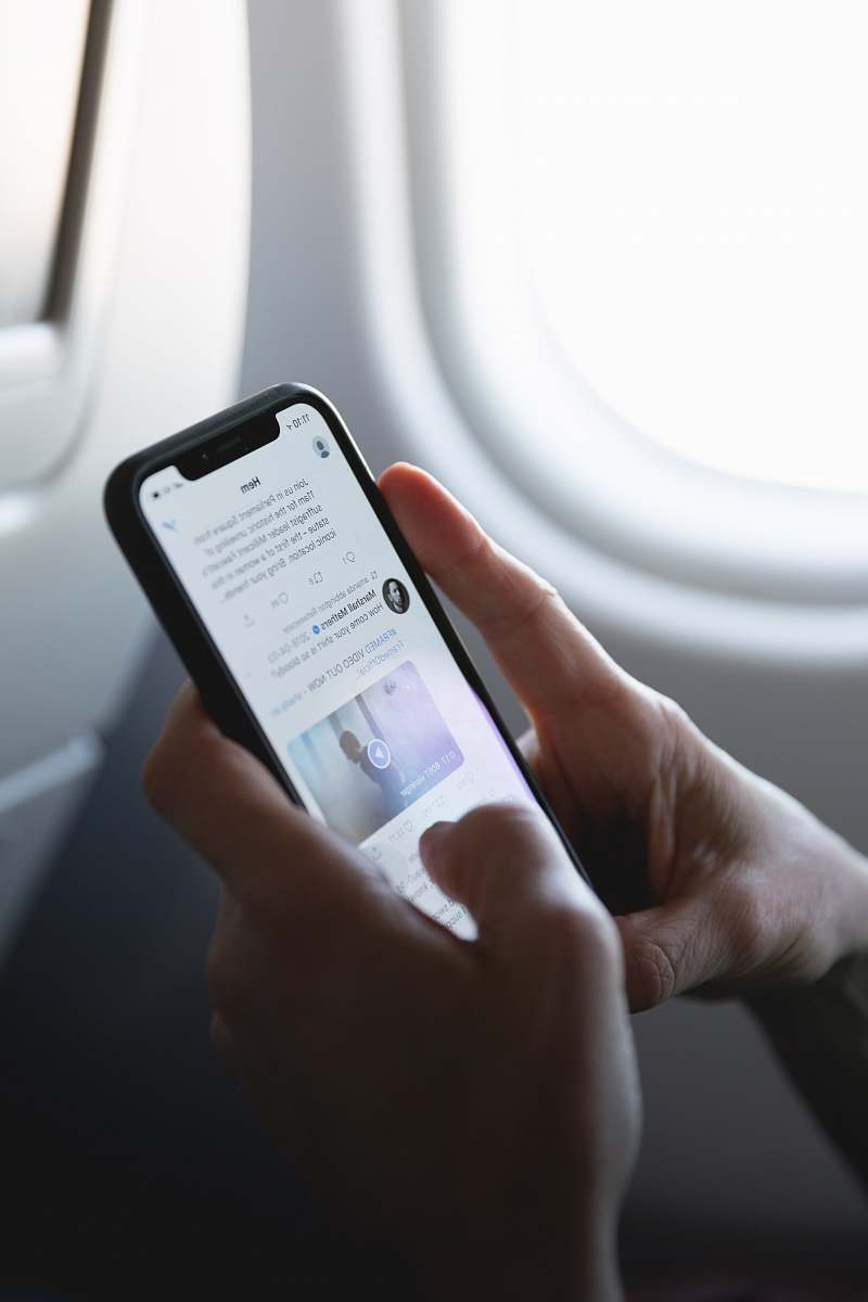 phone person holding space gray iPhone X mobile phone