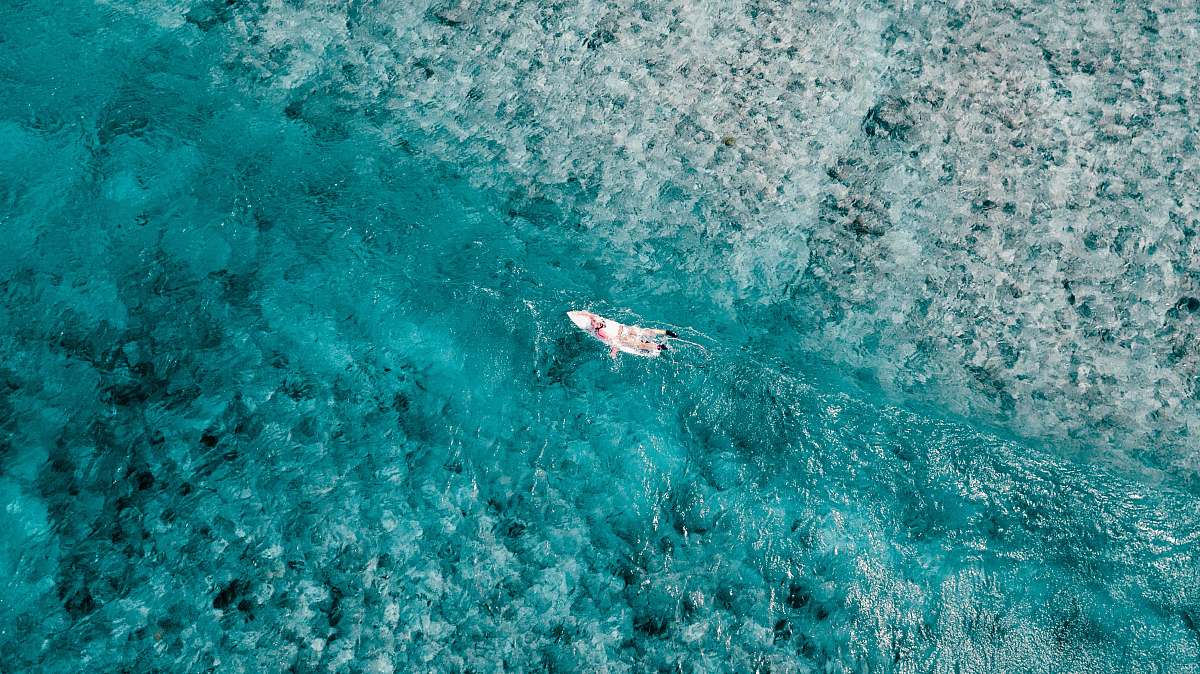 sports aerial photography of white boat during daytime water