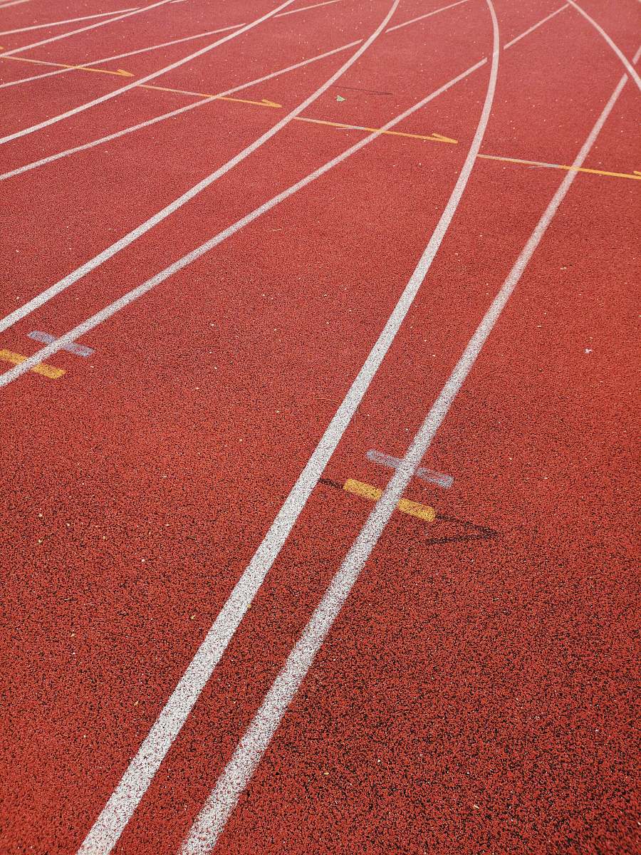 sports empty runner race track during daytime running track