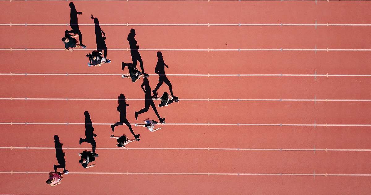 track group of people running on stadium exercise