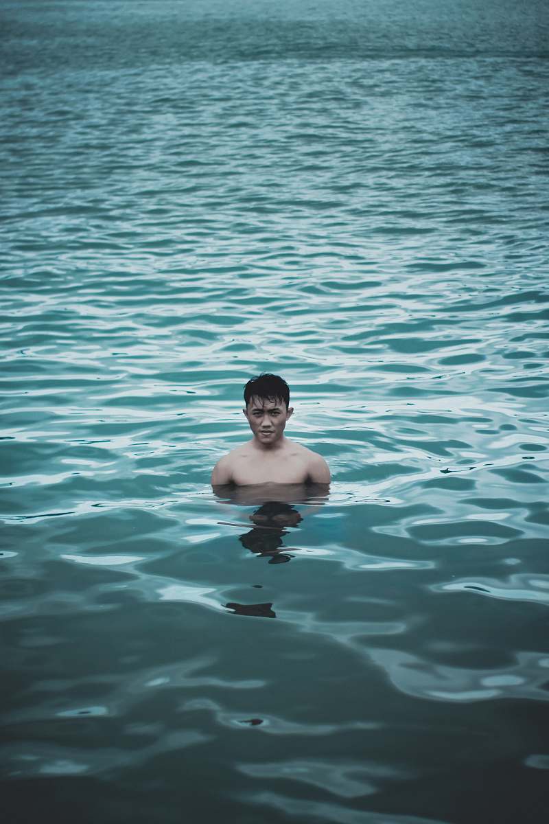 Experience the soothing essence of a man bathing in calm waters, where tranquility meets rejuvenation. This captivating scene captures the essence of relaxation and freedom, perfect for wellness, lifestyle, and nature-themed projects. Ideal for advertisers, content creators, or anyone seeking to evoke a sense of peace and harmony in their visuals.