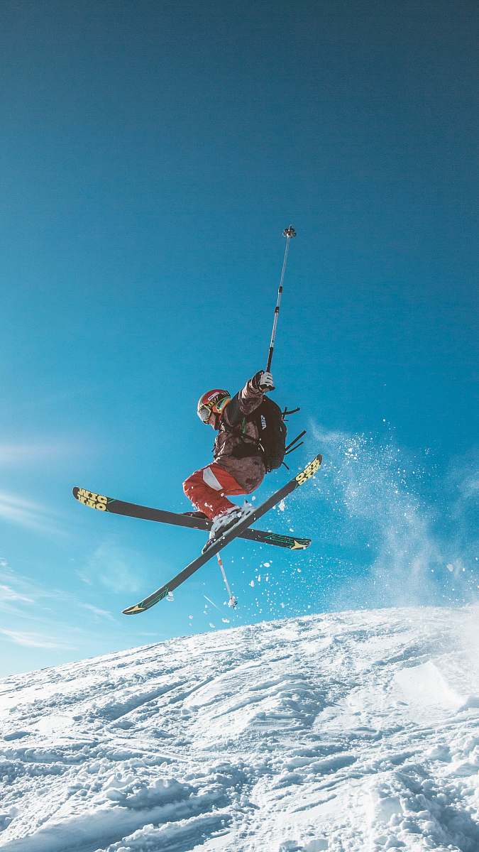 snow man skiing on land skiing