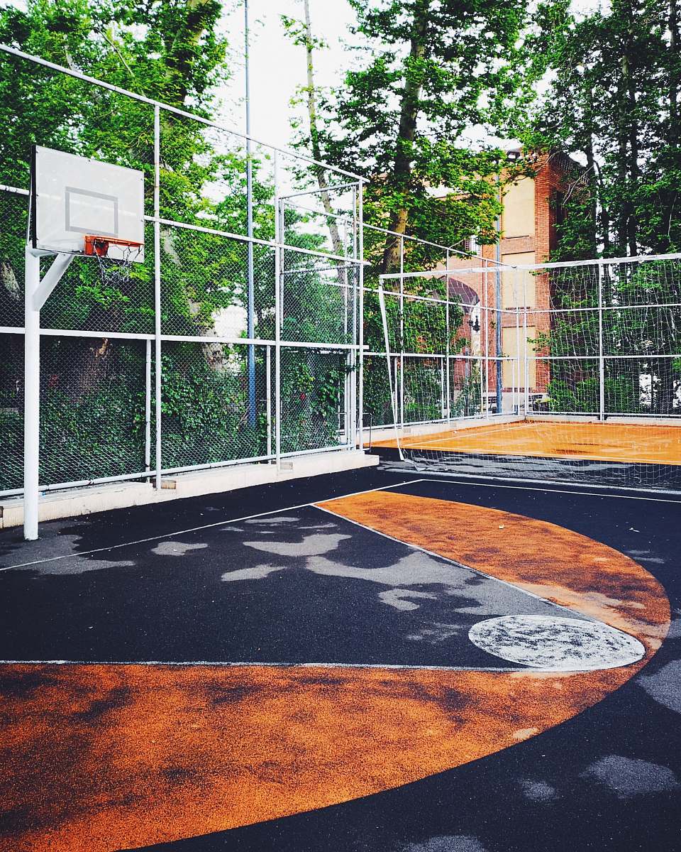 team white and black basketball court basketball