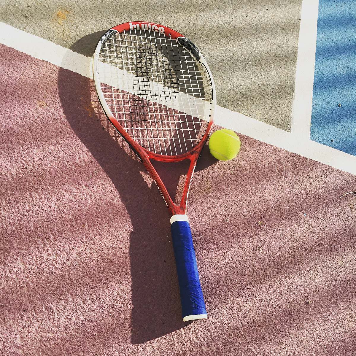 tennis yellow and white tennis racket racket