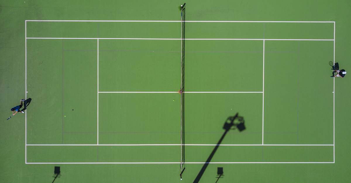 sport high angle photography of sports field tennis court