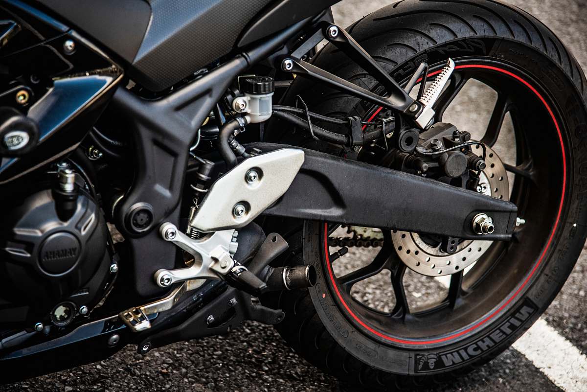 wheel parked black sports bike machine