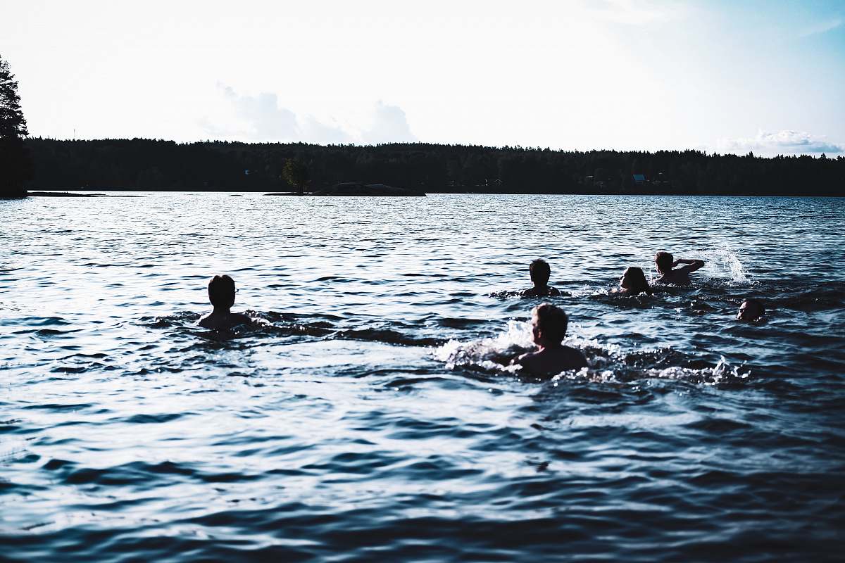 person people swimming in water human
