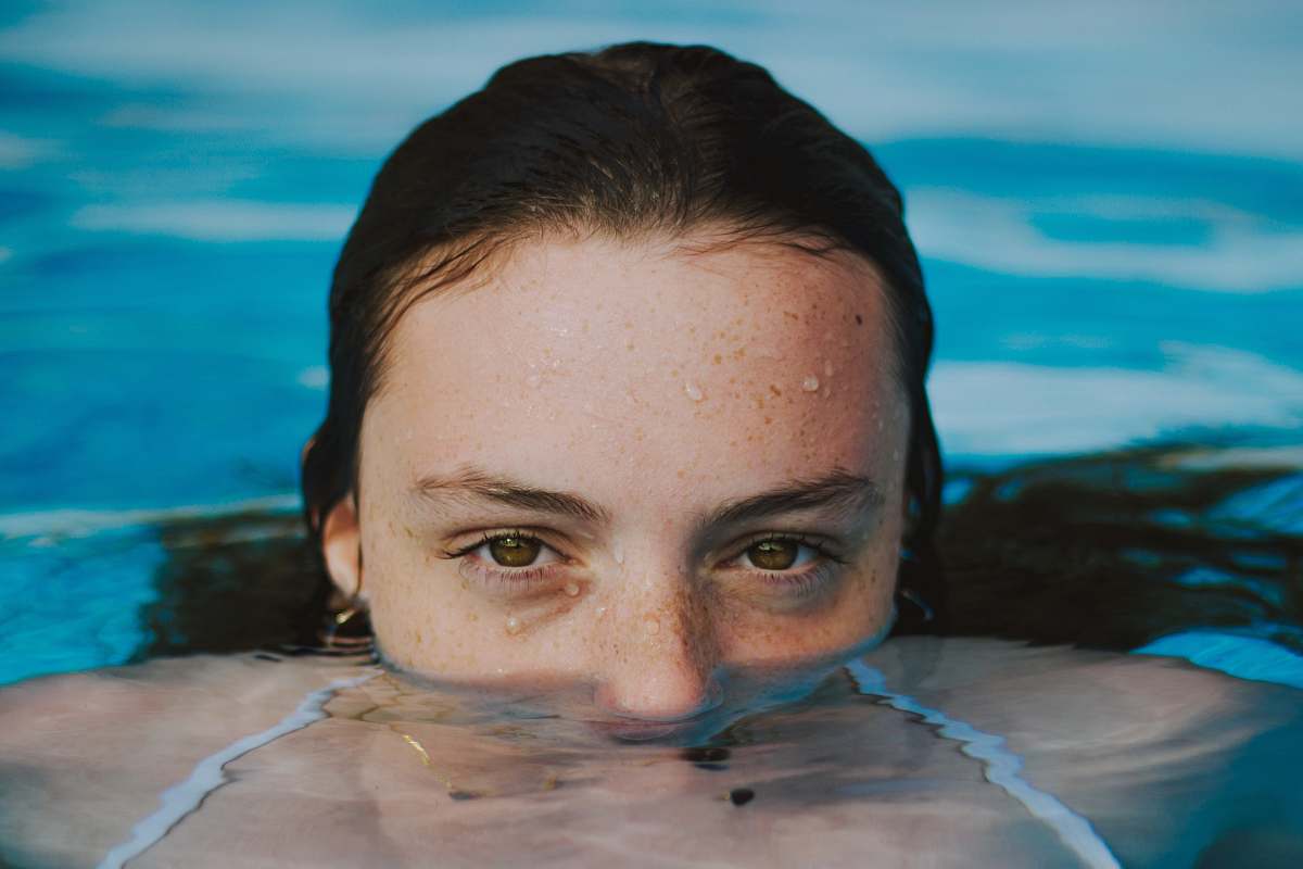 sports woman face close-up photography swimming