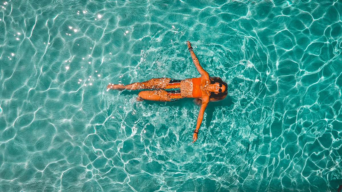 swimming woman swimming alone in body of water sport