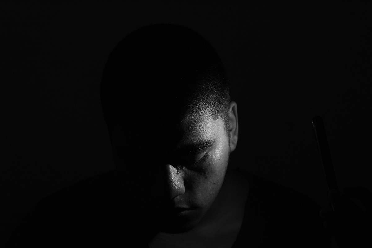 face grayscale close up photo of man's face portrait