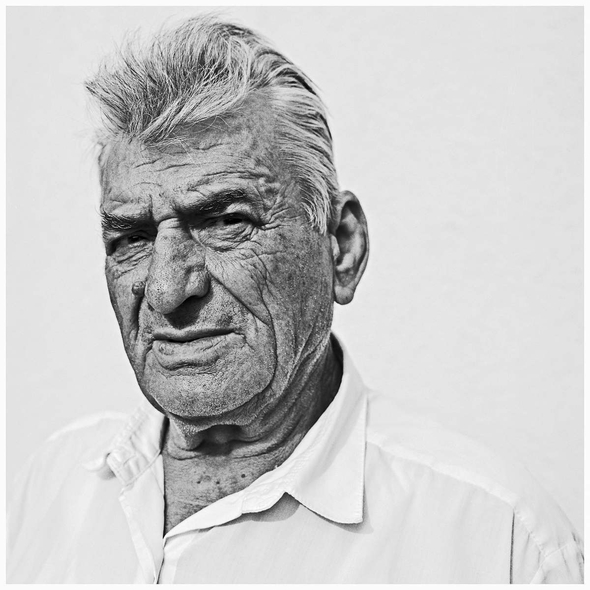 portrait grayscale photo of man face
