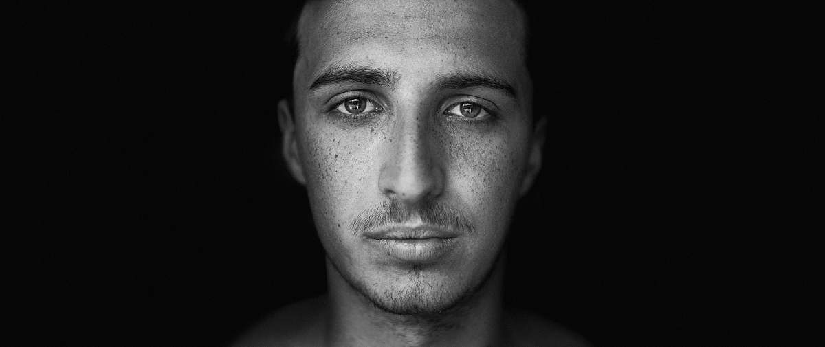 face grayscale photo of mans face portrait