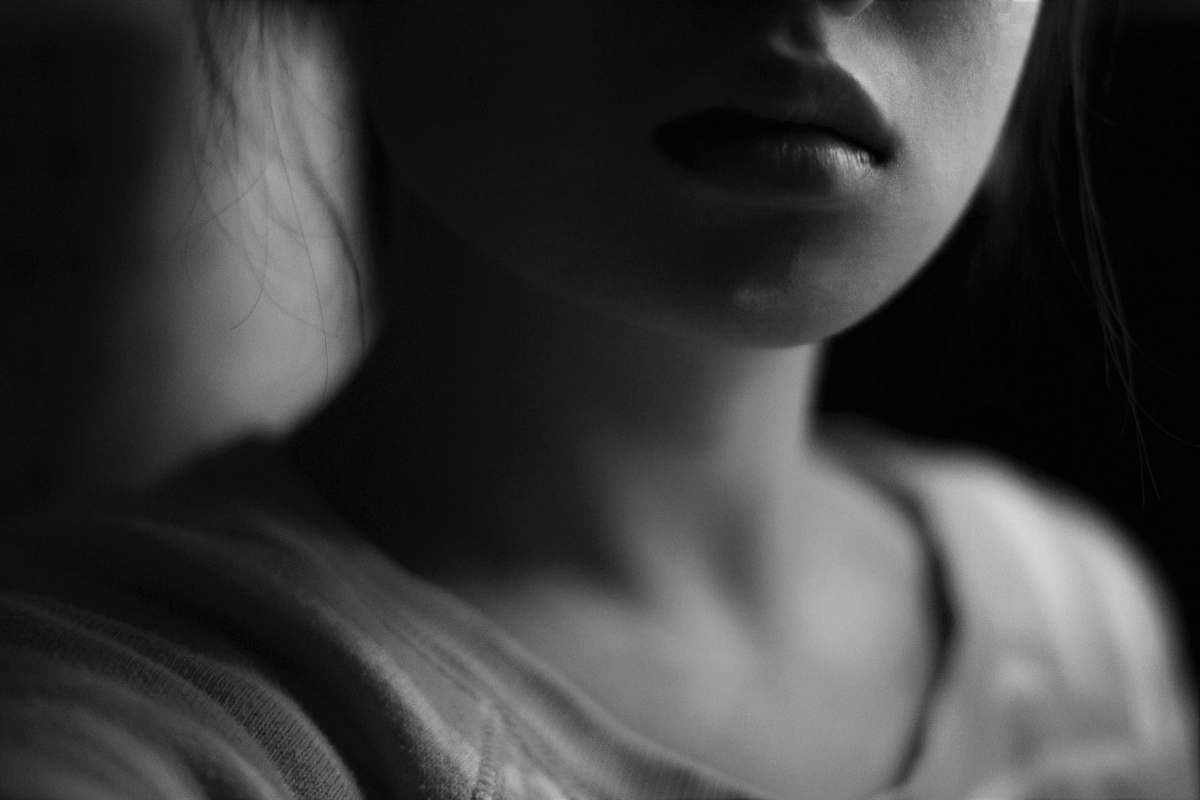 person grayscale photo of woman's face human