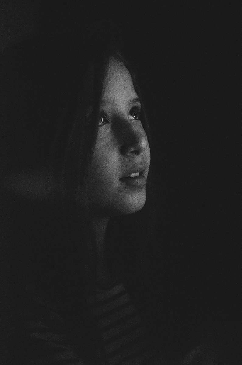portrait grayscale photography of a girl looking up person