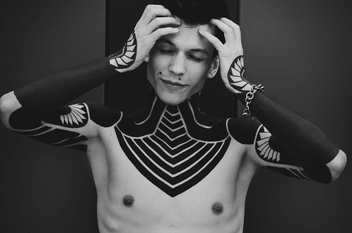 person grayscale photography of man skin