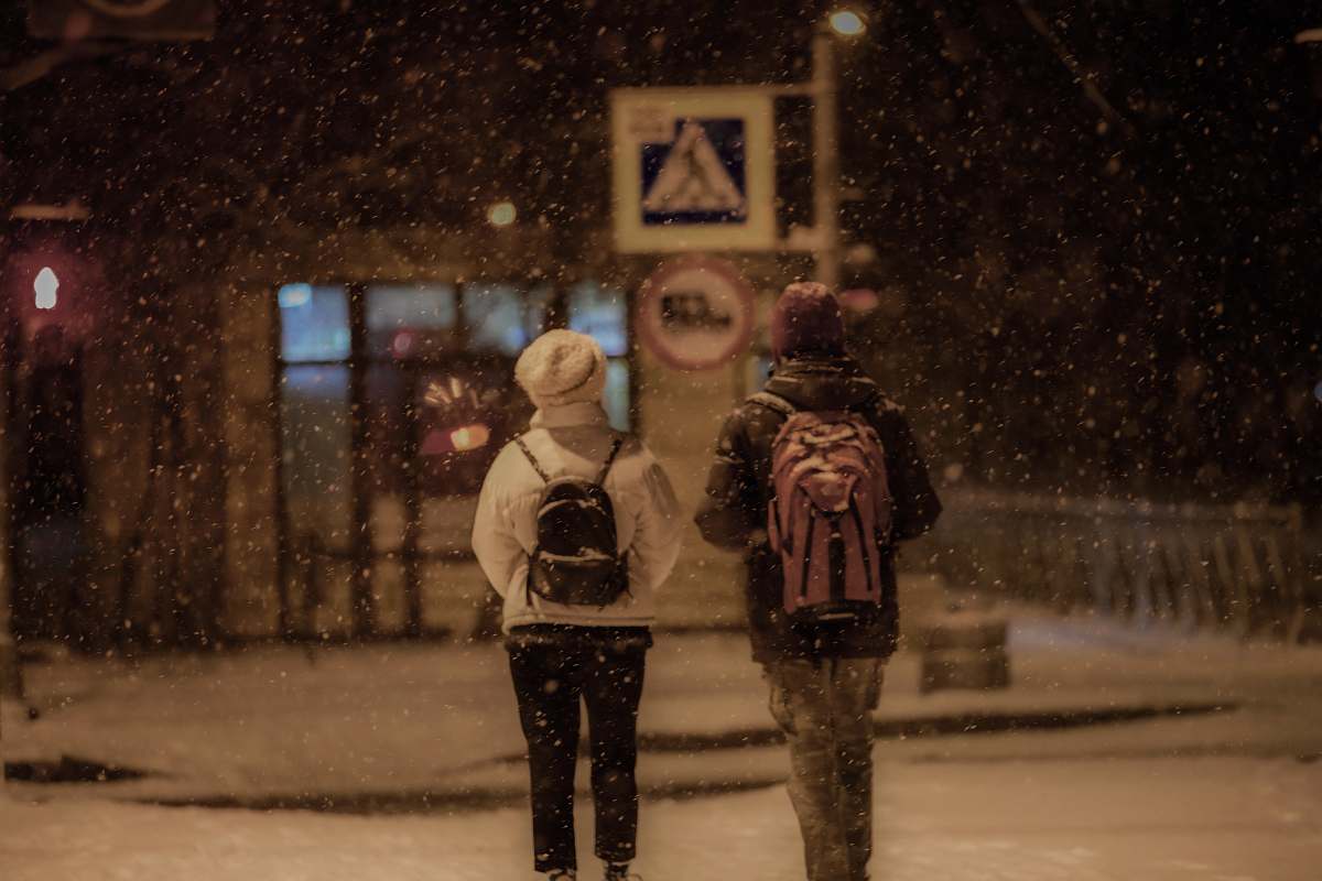 nature couple walking outside with snow outdoors
