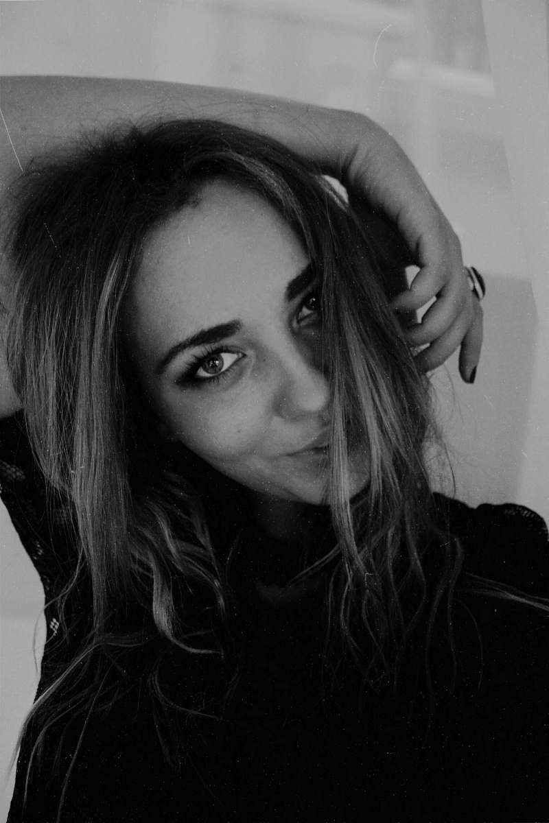 human grayscale photo woman in shirt black-and-white
