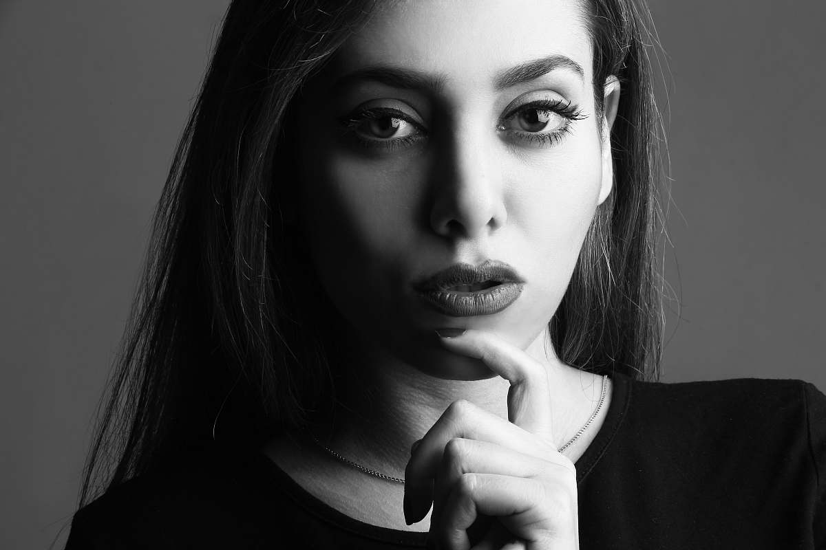person grayscale portrait photo of woman with makeup black-and-white