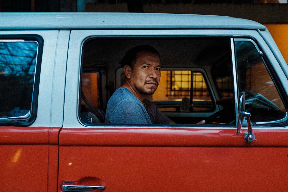 person man driving inside the car human