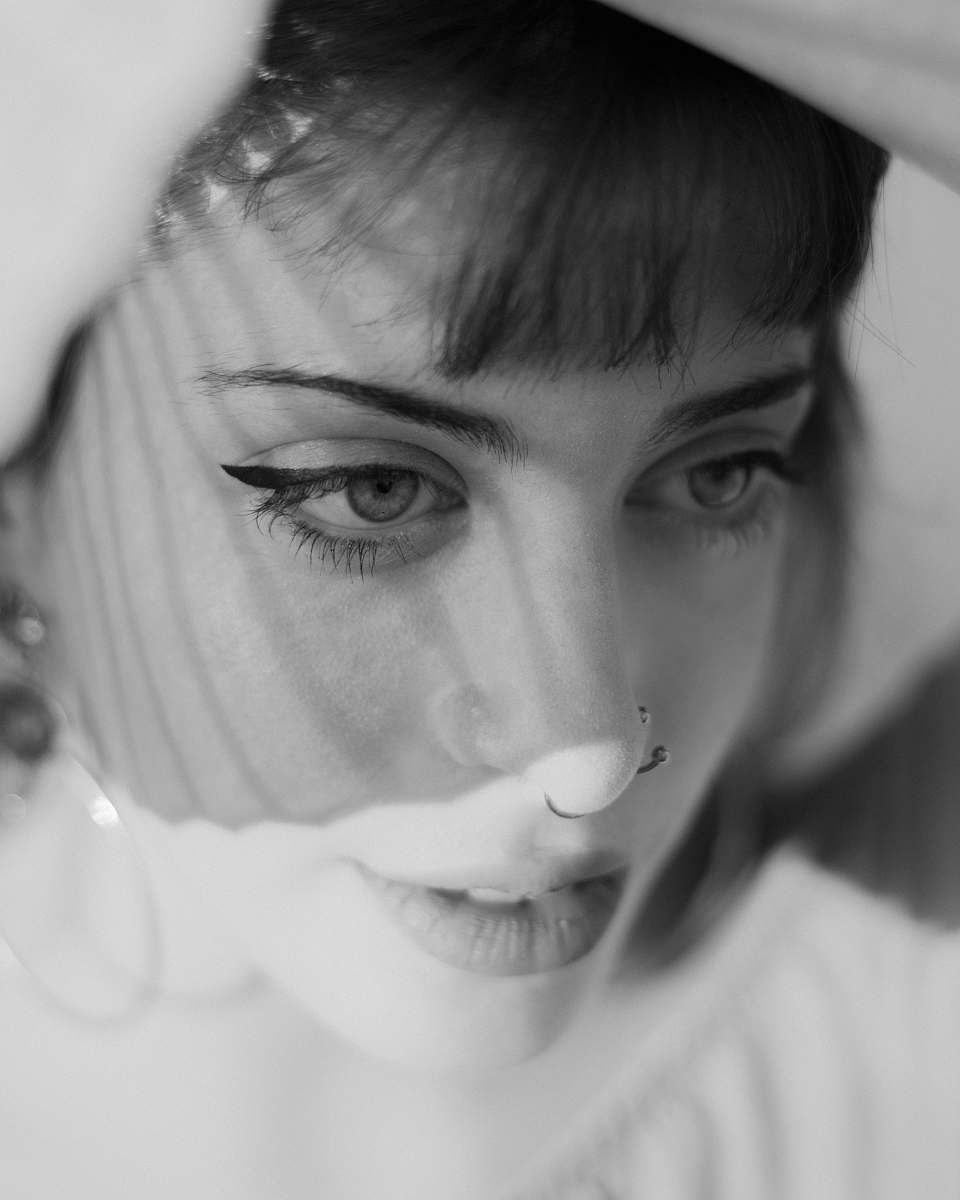 person woman's profile black-and-white