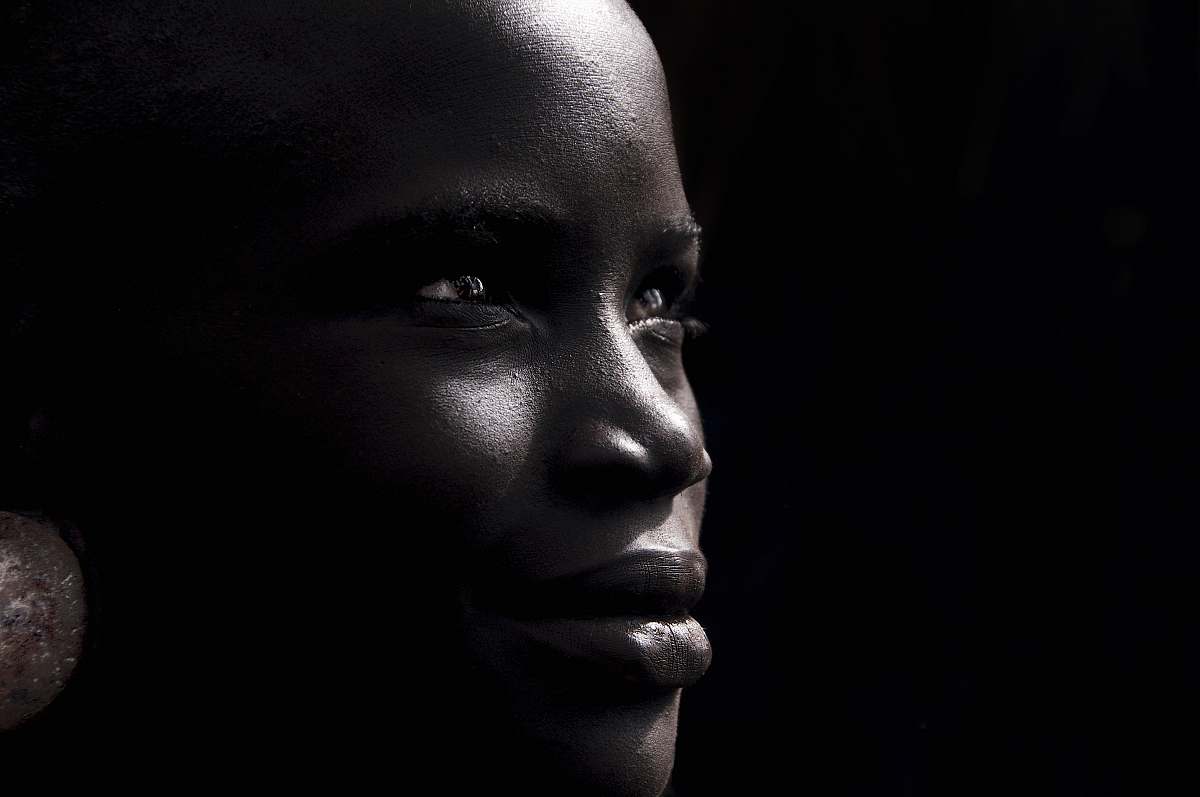 ethiopia photo of woman wearing silver-colored hoop earring face