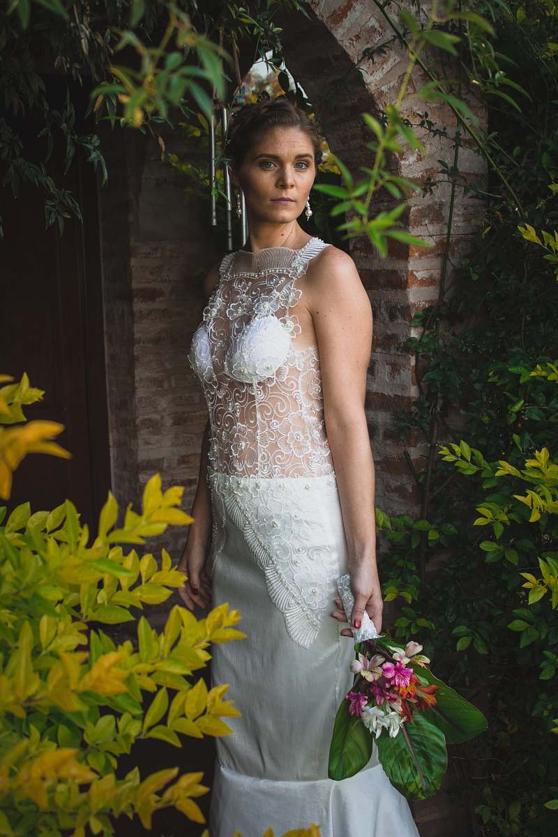 clothing woman standing beside flower fashion