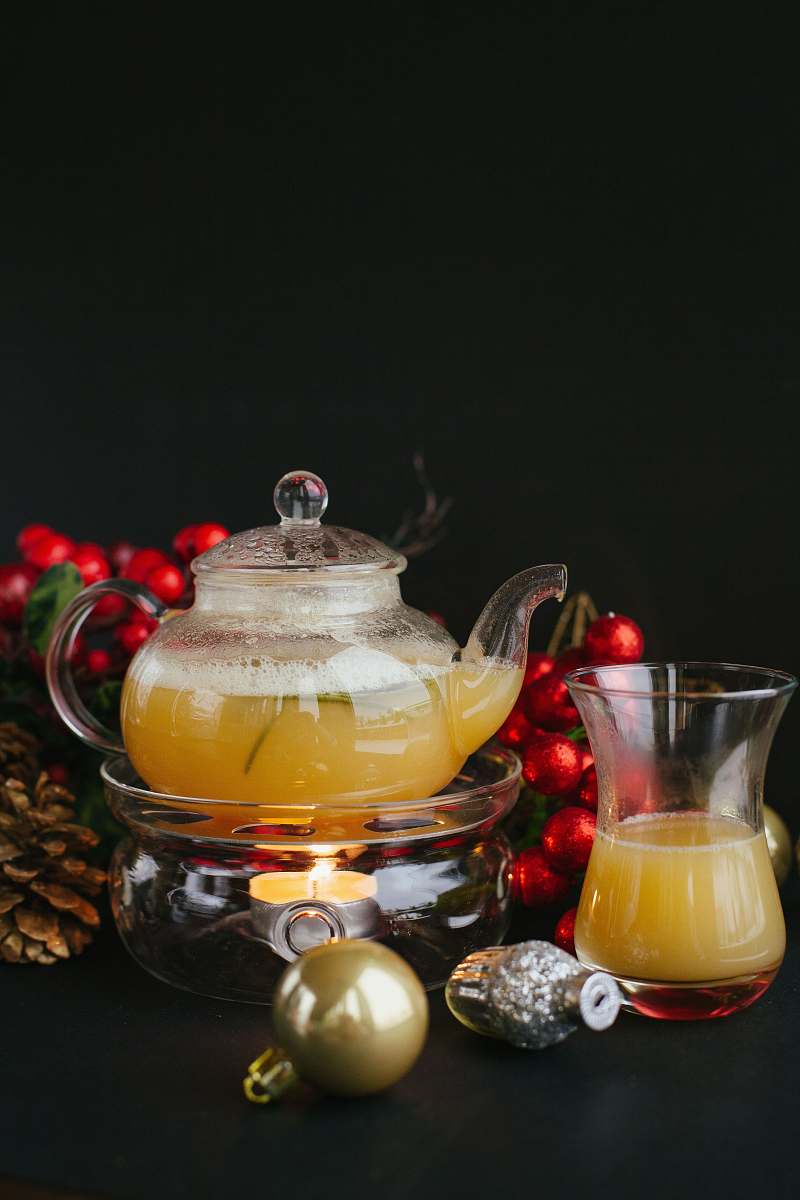 drink clear glass pitcher filled with yellow liquid juice