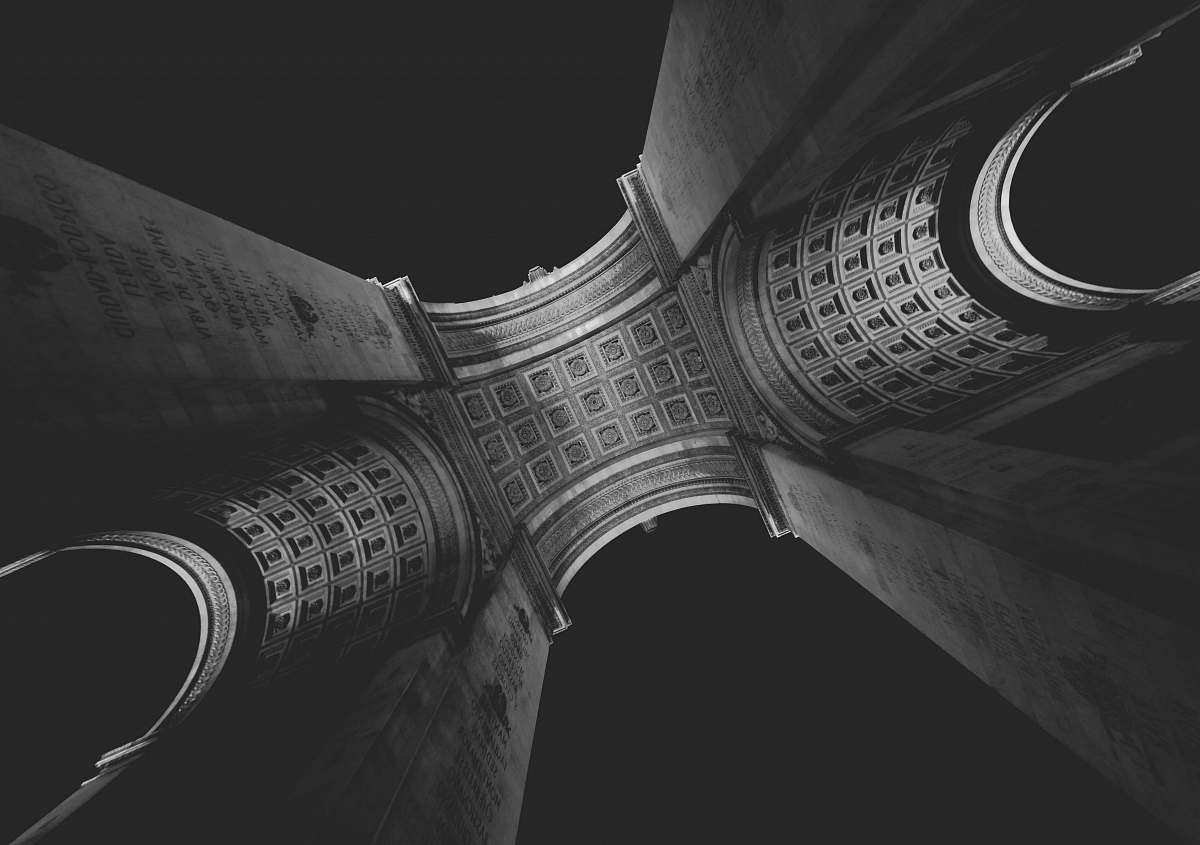 black-and-white low angle photography of building architecture