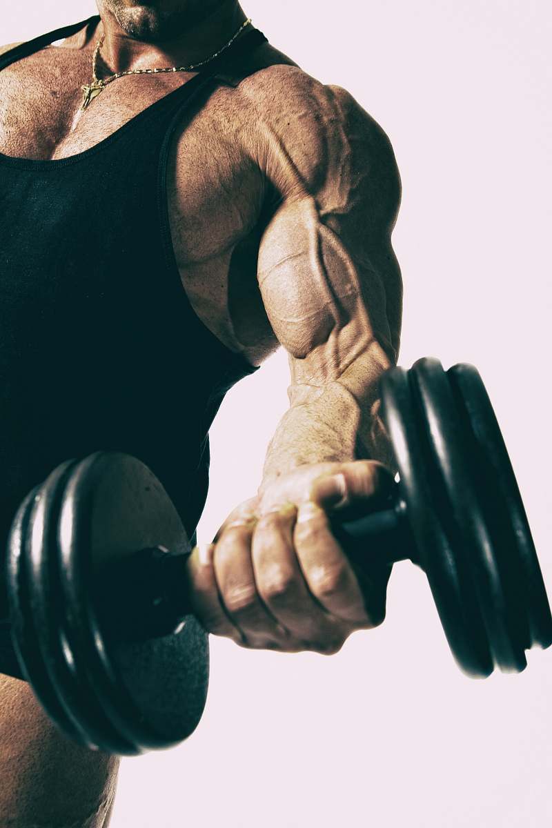 sport man lifting black dumbbell exercise