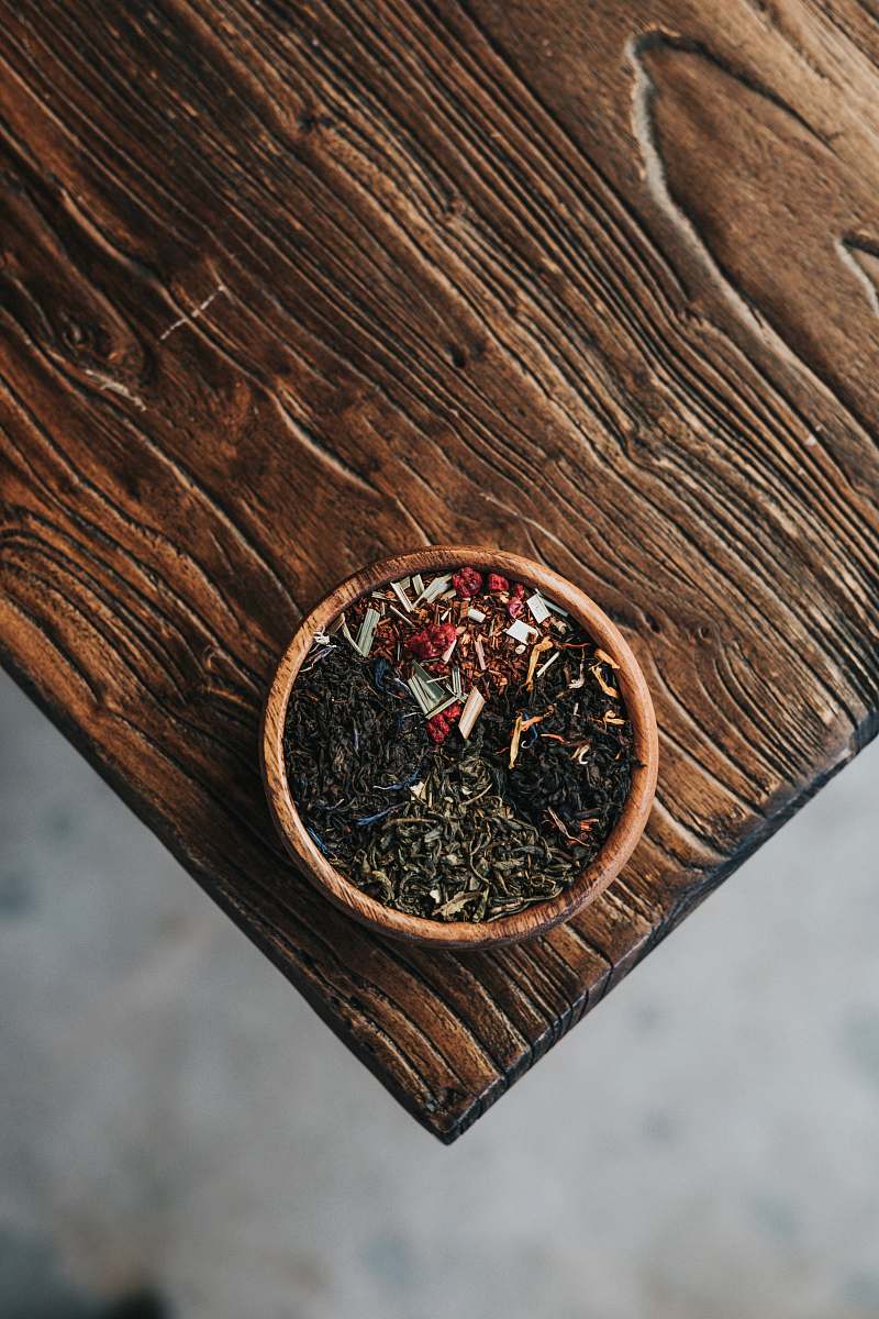 tea powder filled brown bowl table