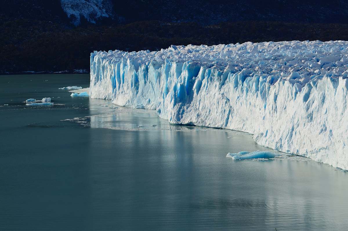 Glacier Ice Cliff Near On Body Of Water Outdoors Image Free Photo