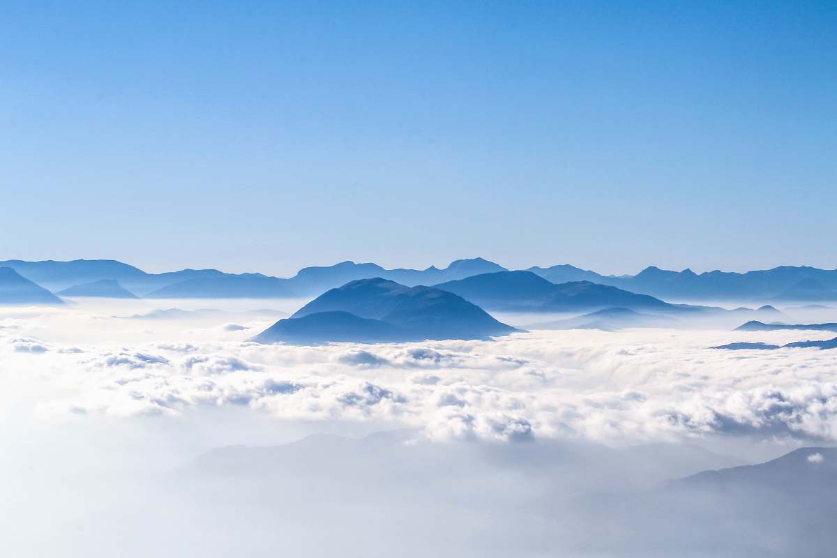 nature aerial photography of mountains blue