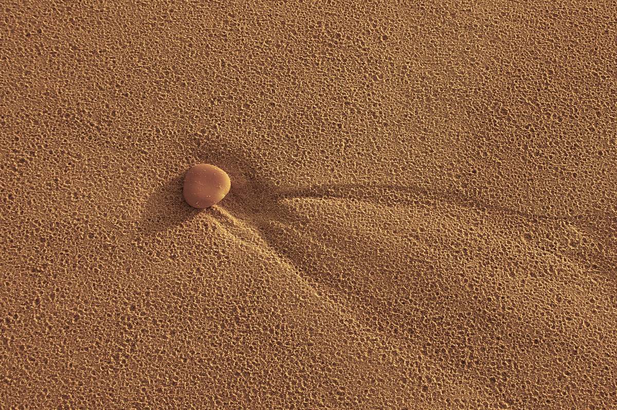 sand pebble on sand dune outdoors