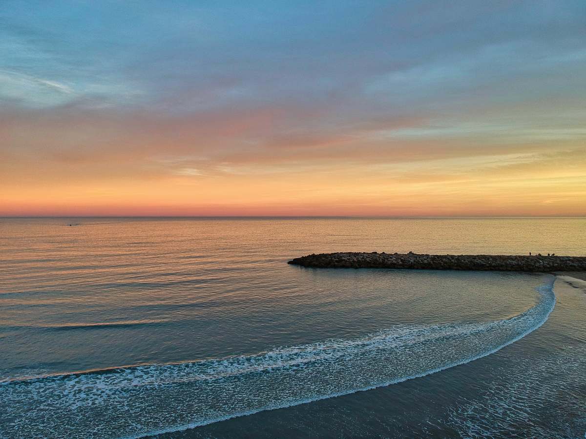 nature golden hour photography of body of water ocean