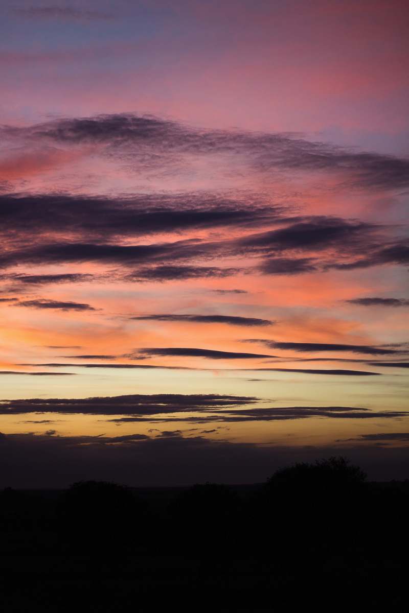 nature mountain silhouette during golden hour sky