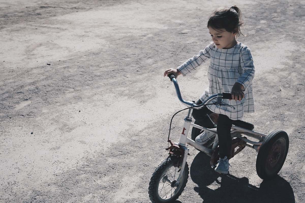 tricycle girl riding trike kid