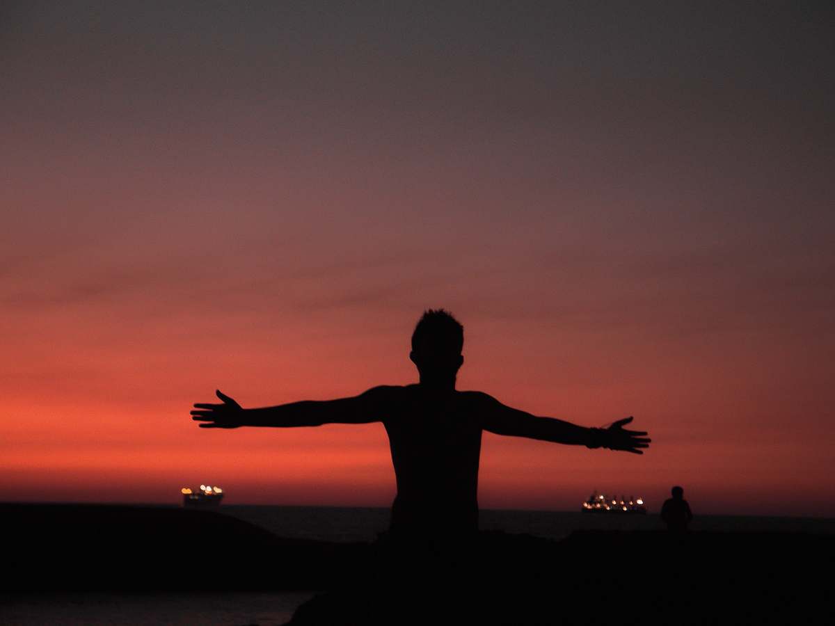 Fitness Silhouette Of Man Spreading Both Arms Working Out Image Free Photo