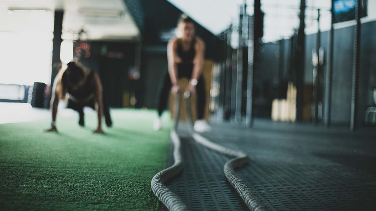 human two person inside gym exercising fitness