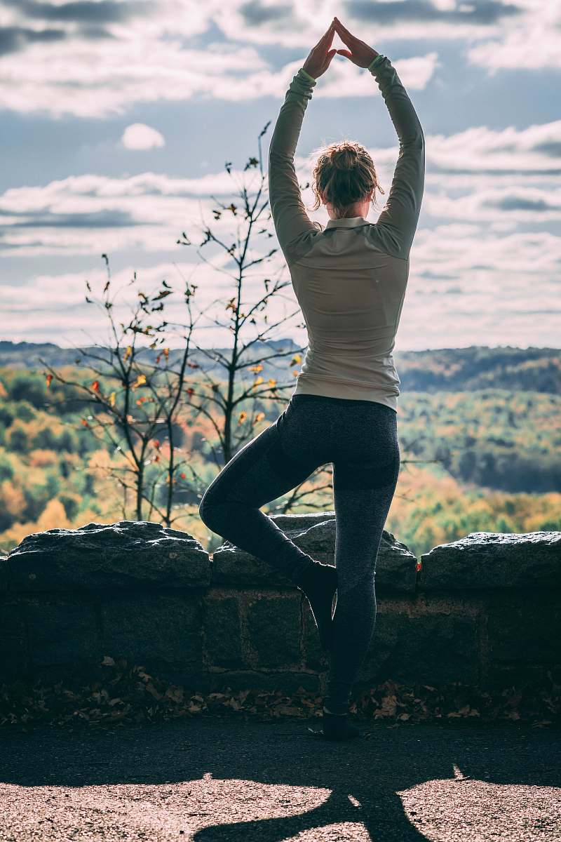 people women in white and gray long-sleeved shirt standing beside creek yoga
