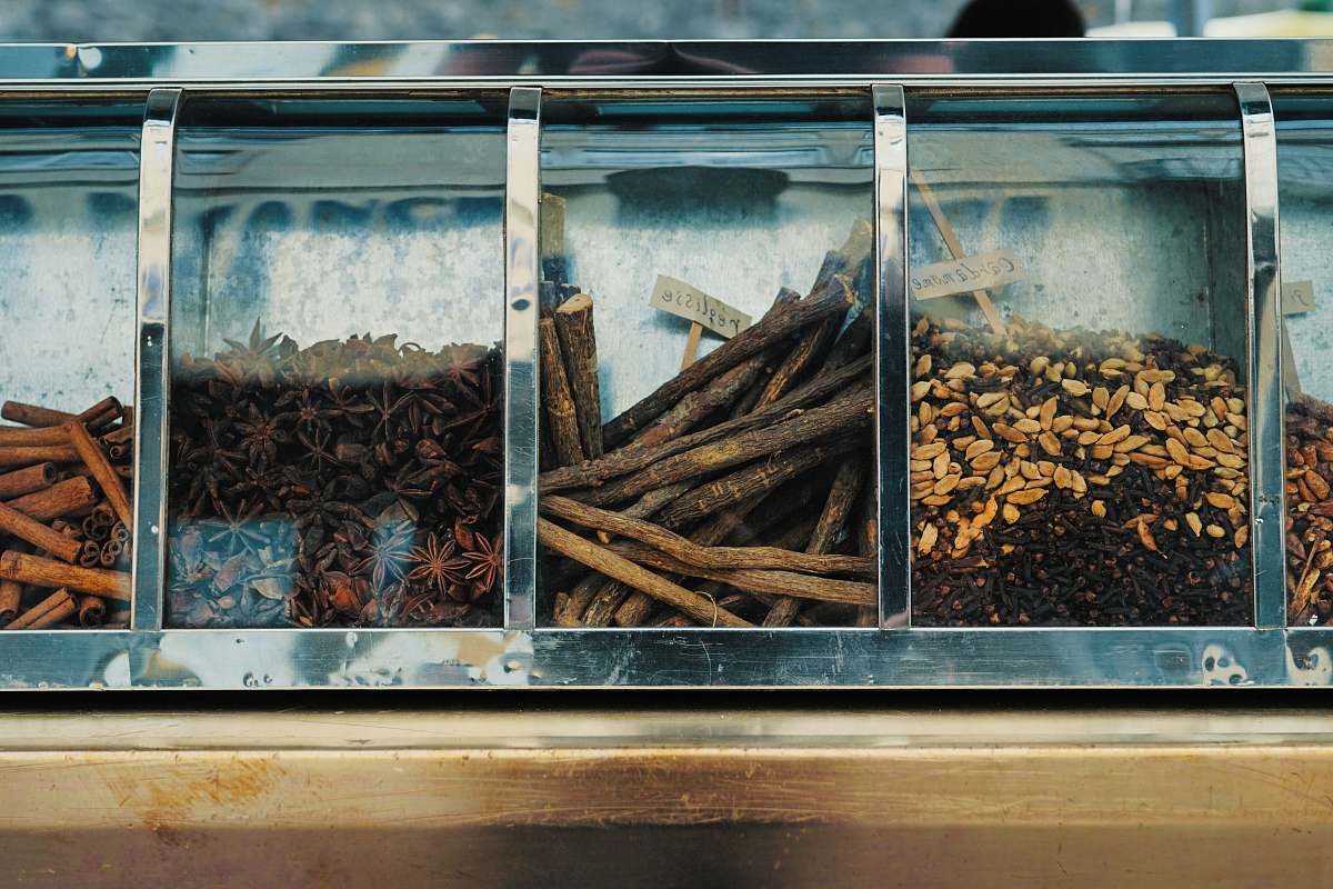 anise focus photography of assorted spices on display counter flavor