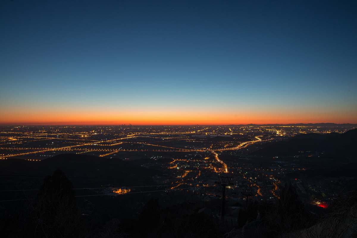 landscape aerial view of city during night time sunrise