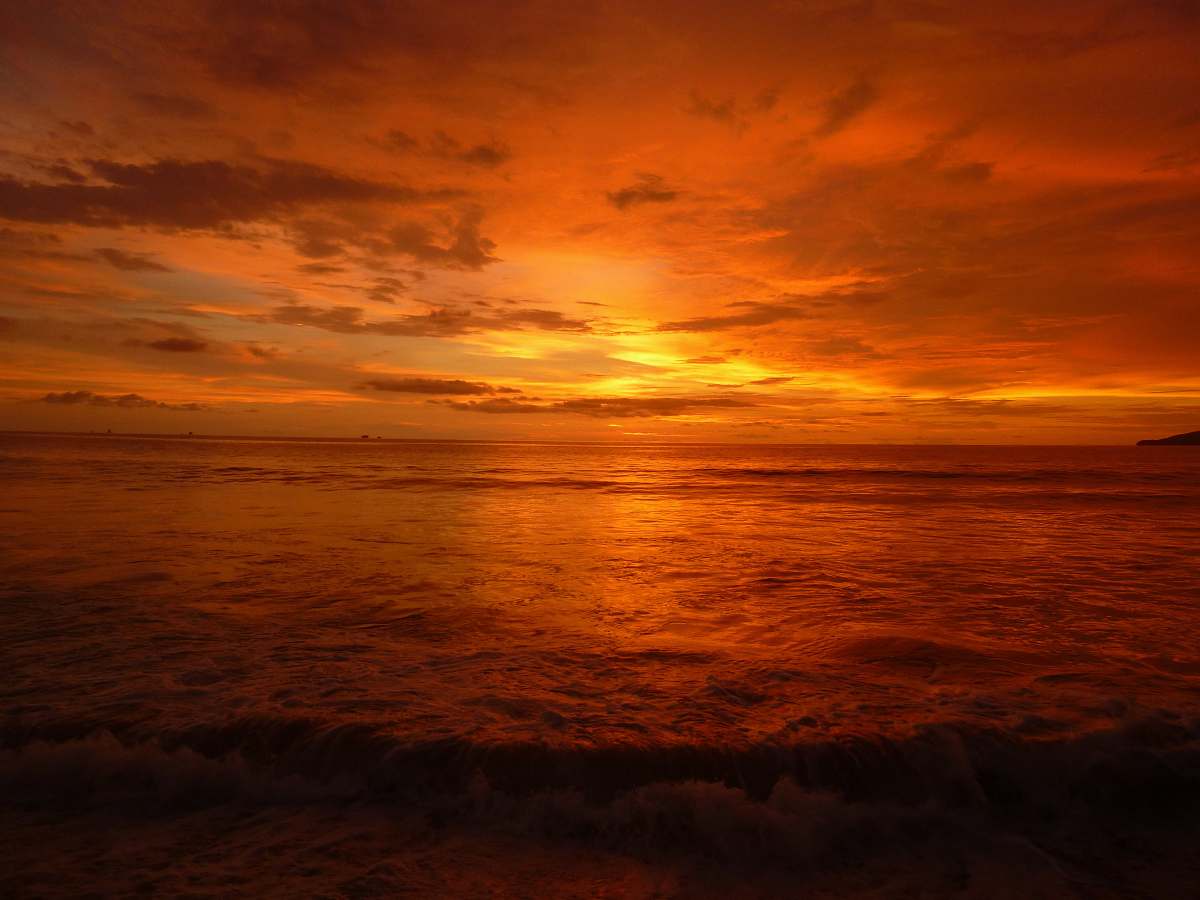 sky body of water during golden hour sunrise