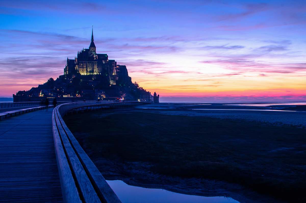 architecture concerete castle during night time castle