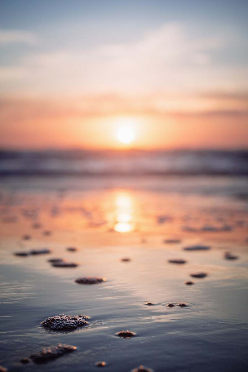 beach reflection of sunset on beachshore ocean