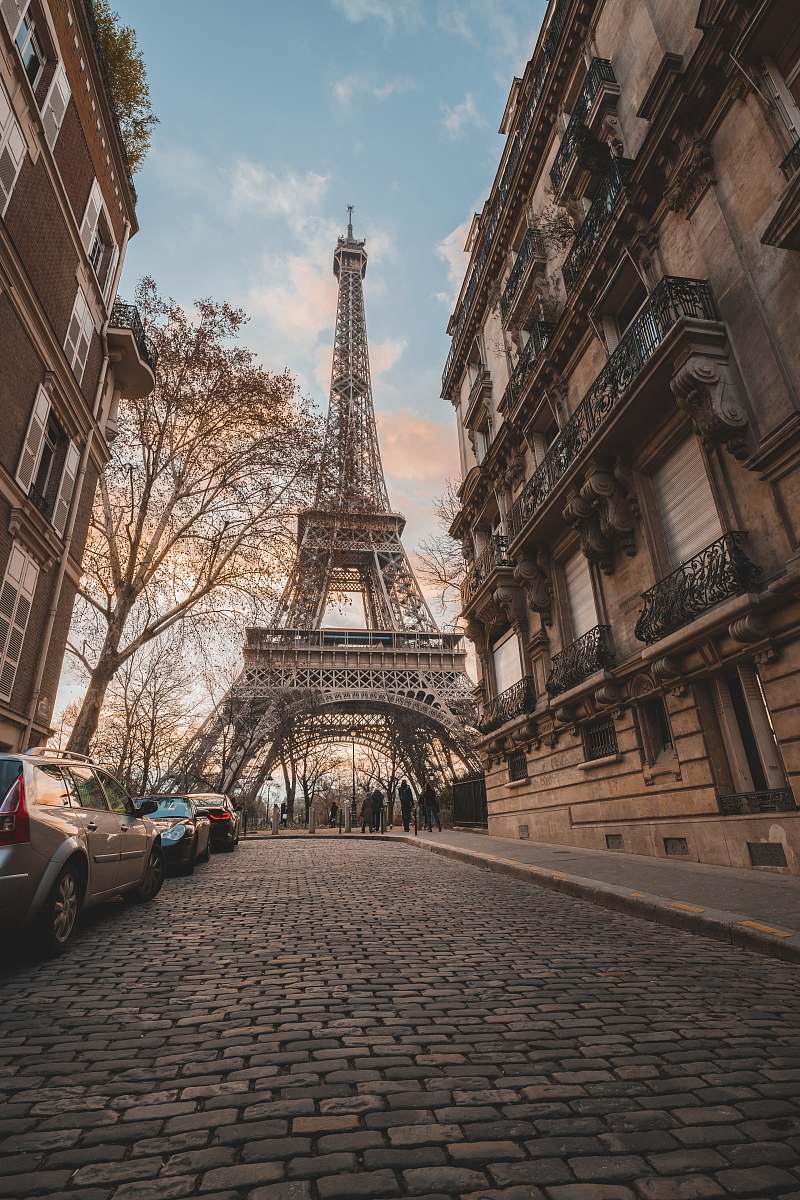 path Eiffel Tower under blue sky during daytime pavement