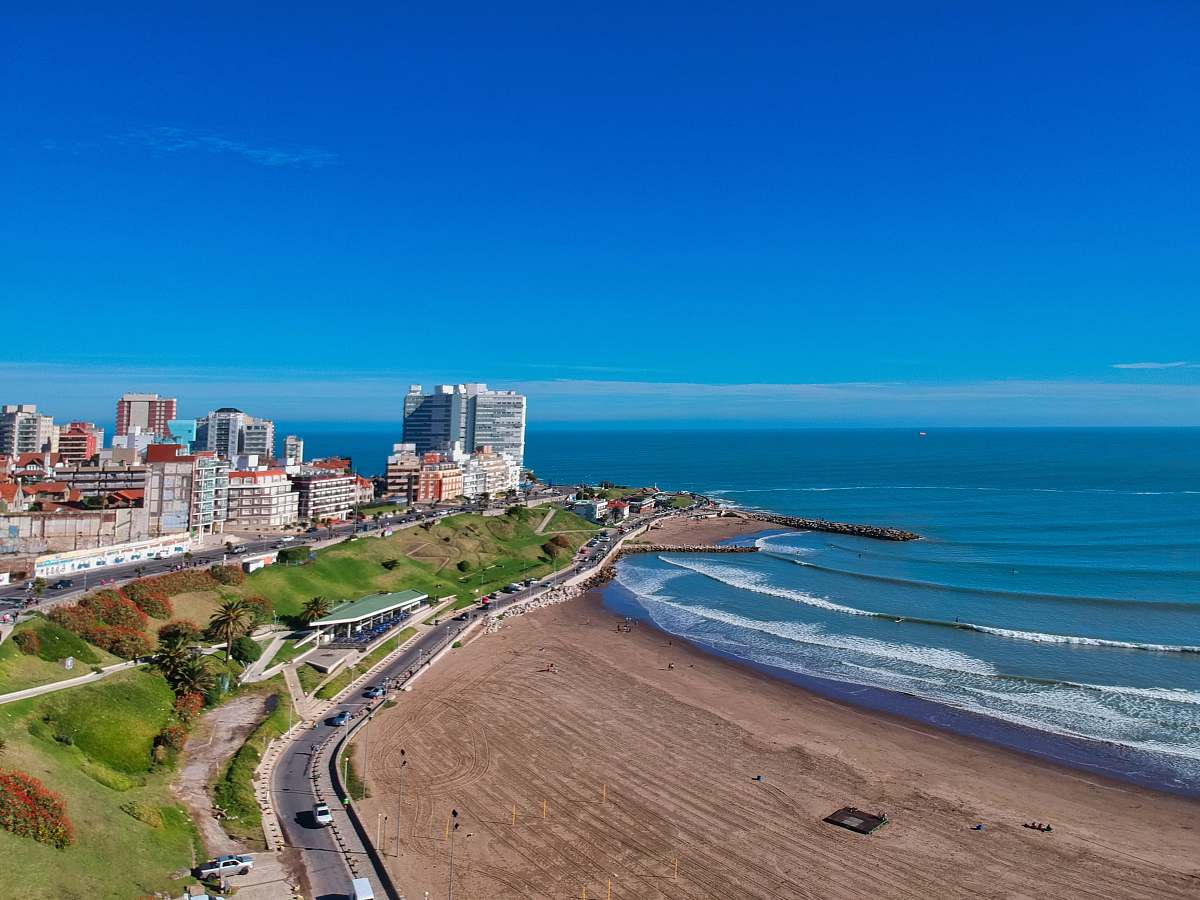 outdoors white and brown buildings and seashore nature